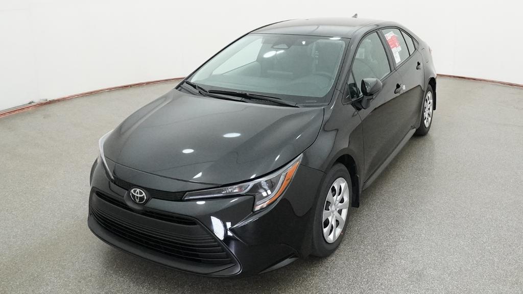 2026 Toyota Corolla LE 4dr Car Slide 2