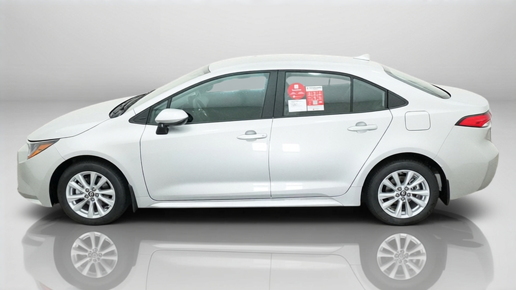 2027 Toyota Corolla LE 4dr Car Slide 4